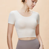 夏の新スタイルバタフライバックスポーツ半袖女性の裾を広げたアウトドアスポーツウェア取り外し可能な胸パッドトップ Tシャツ