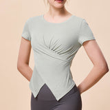 夏の新スタイルスポーツヨガ半袖女性のラウンドネックツイストチェスト Tシャツ吸湿発散性ランニングフィットネストップ女性のに向け
