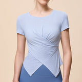 夏の新スタイルスポーツヨガ半袖女性のラウンドネックツイストチェスト Tシャツ吸湿発散性ランニングフィットネストップ女性のに向け